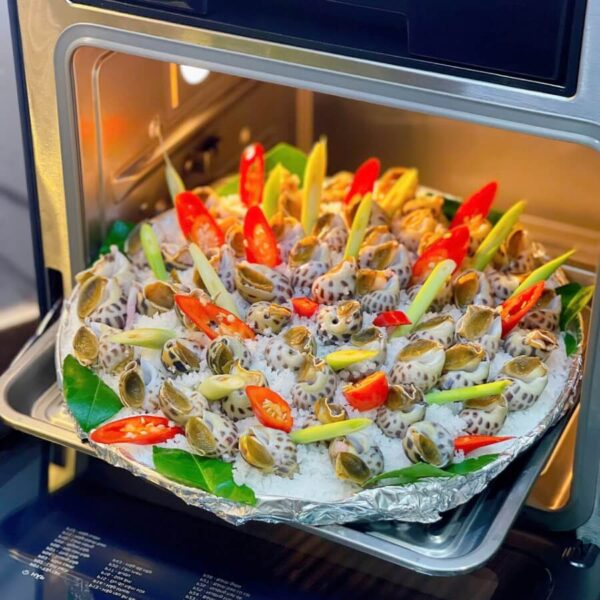 Cách làm ốc hương hấp muối - cho vào nồi